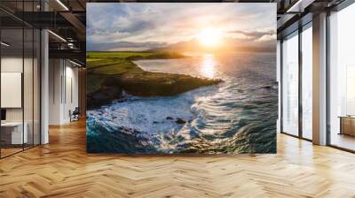 Aerial panorama view of the North Shore of Maui on the coast with clear blue ocean and big waves crashing on rocks at sunset. Maui, Hawaii Wall mural