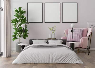 Poster mockup with three frames on empty wall in living room interior with pink armchair pillow and lilac plaid. 3D rendering. Wall mural