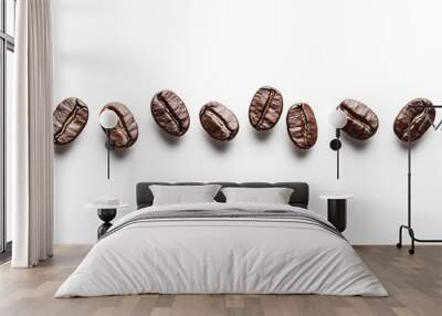 Row of coffee beans on a white background. Copy space Wall mural