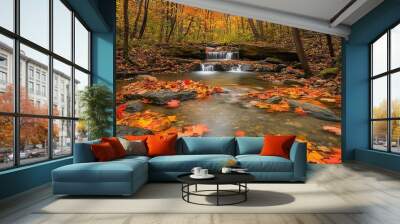 Tranquil autumn forest stream with colorful fallen leaves Wall mural