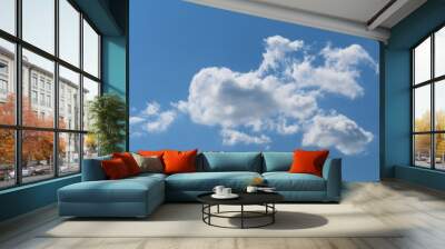 Big white cloud on a beautiful blue sky Wall mural