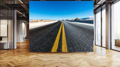 yellow dividing line on asphalt road Wall mural