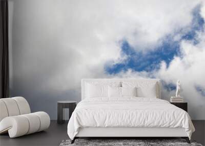 White passenger airplane flying in the sky amazing clouds in the background - Travel by air transport. High quality photo Wall mural