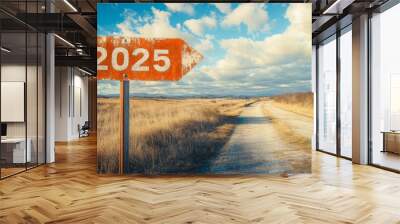 Red road sign on the side of empty street written 2025. Metal plate sign 2025 next to desert. represent the future and positivity and success of the new year Wall mural