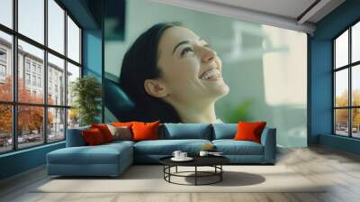 radiant woman in dental chair genuine smile modern clinic environment Wall mural