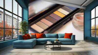 makeup brushes and tools on background. Wall mural