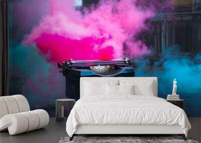 Vintage Typewriter Surrounded by Pink and Blue Smoke Wall mural