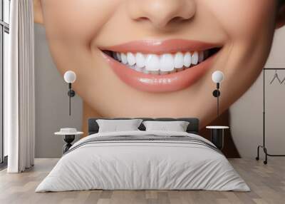 A close - up image of a woman's mouth ,perfect white smile and white teeth. Wall mural