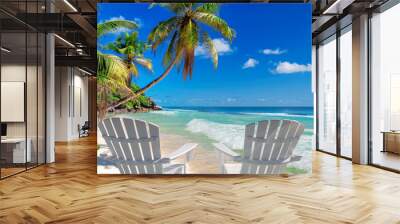 Beach chairs on sandy beach with palm and turquoise sea.  Summer vacation and travel concept.   Wall mural