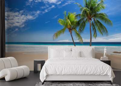 Tropical paradise beach. Palm trees on tropical white sand sunny beach Wall mural