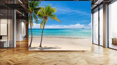 Tropical sunny beach with coco palms and the turquoise sea on Jamaica Caribbean island. Wall mural