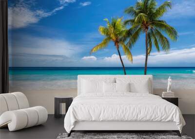 Tropical white sand beach with coco palms and the turquoise sea on Caribbean island. Wall mural