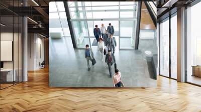  Group of professional business people walking in building. Wall mural