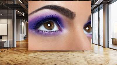 eyes with purple makeup Wall mural