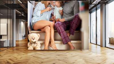 Female child with parents enjoying Wall mural