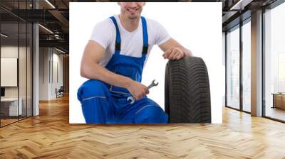 Friendly car mechanic with  tires Wall mural