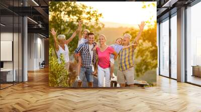 happy family on vacation posing together. Wall mural