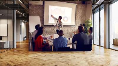 Man show data on chart for success in company Wall mural