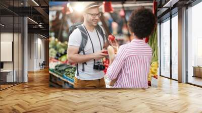 Sales of fresh and organic vegetables and  fruits at the green market or farmers market.  Buyers choose and buy products for healthy food in grocery. All for diet healthy eating, lifestyle. Wall mural