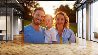 Smiling family together, portrait Wall mural