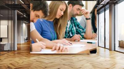 students having a test in a classroom Wall mural