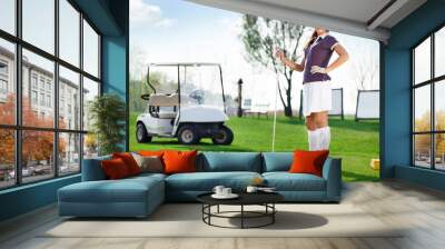 woman playing golf Wall mural