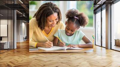 African American kid girl doing homework, mother help and supports  Wall mural