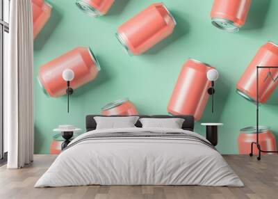 Isometric view of vibrant coral soda cans on pastel green background in flat lay arrangement. Top down perspective showcasing minimalistic and modern beverage packaging design concept.  Wall mural