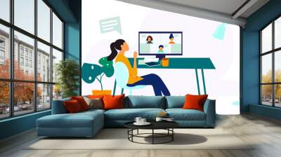 Girl communicates online via video conferencing Wall mural