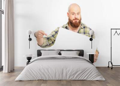 man with long beard holding a white board and pointing it Wall mural