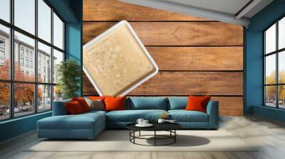 Delicious rice pudding in square bowl - Dessert with milk and vanilla essence Wall mural