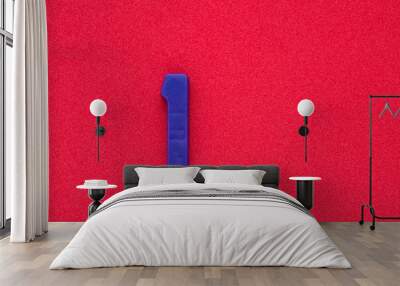 Number 1 in purple - Plastic piece on a red background 032 c foamy Wall mural