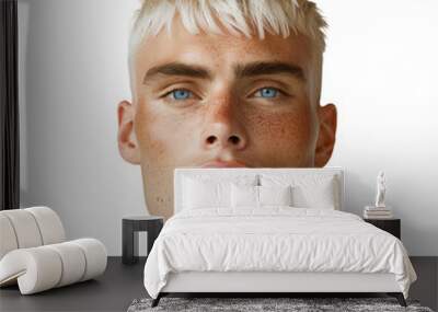 Close-up portrait of young man with blonde hair and blue eyes. Wall mural