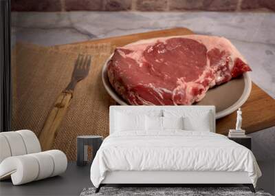 red veal chop on a plate Wall mural