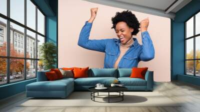 African american woman over isolated background celebrating a victory Wall mural