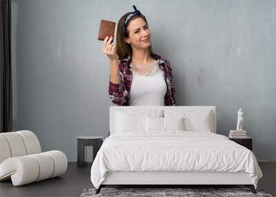 Craftsmen or electrician woman holding a wallet Wall mural