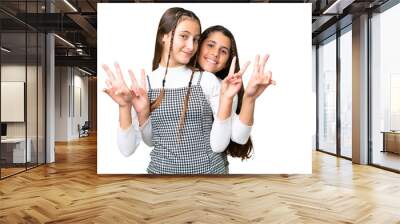 Friends girls over isolated chroma key background Wall mural