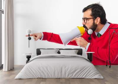 Hipster man shouting by megaphone Wall mural