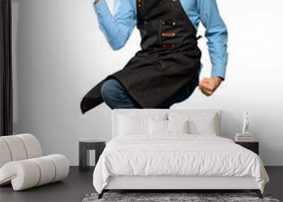 Man with apron  jumping Wall mural