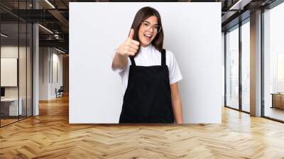 restaurant brazilian waiter woman isolated on white background with thumbs up because something good Wall mural