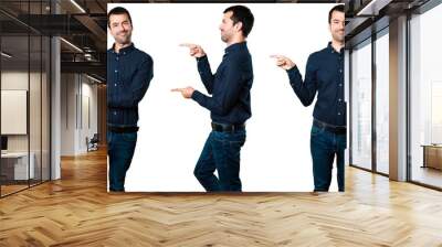 Set of Handsome man pointing to the lateral Wall mural