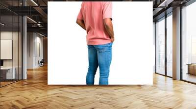 Standing young african american man looking back on isolated white background. Ideal for use in architectural designs Wall mural