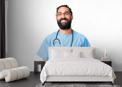 Young doctor man over isolated chroma key background with glasses and happy Wall mural