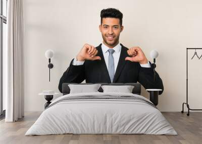 Young handsome businessman man over isolated background proud and self-satisfied Wall mural