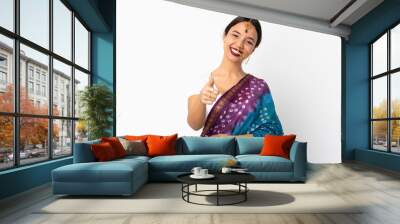 Young indian woman isolated on white background with thumbs up because something good has happened Wall mural