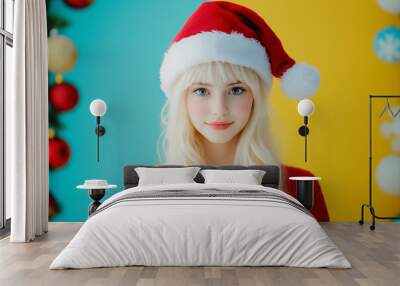 Young pretty woman with red Christmas hat Wall mural