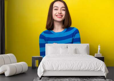 Young Ukrainian woman isolated on yellow background laughing Wall mural