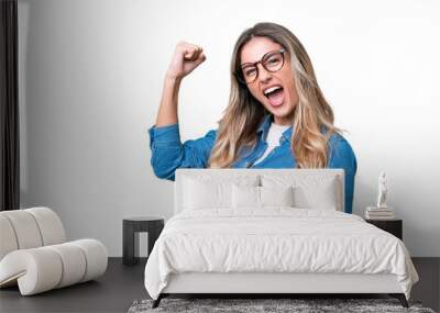 Young Uruguayan woman over isolated background celebrating a victory Wall mural