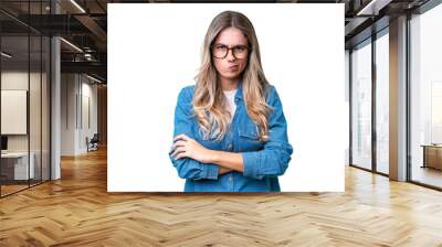 Young Uruguayan woman over isolated background with unhappy expression Wall mural