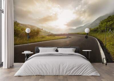 Asphalt road in Dolomites in a summer day, Italy. Wall mural